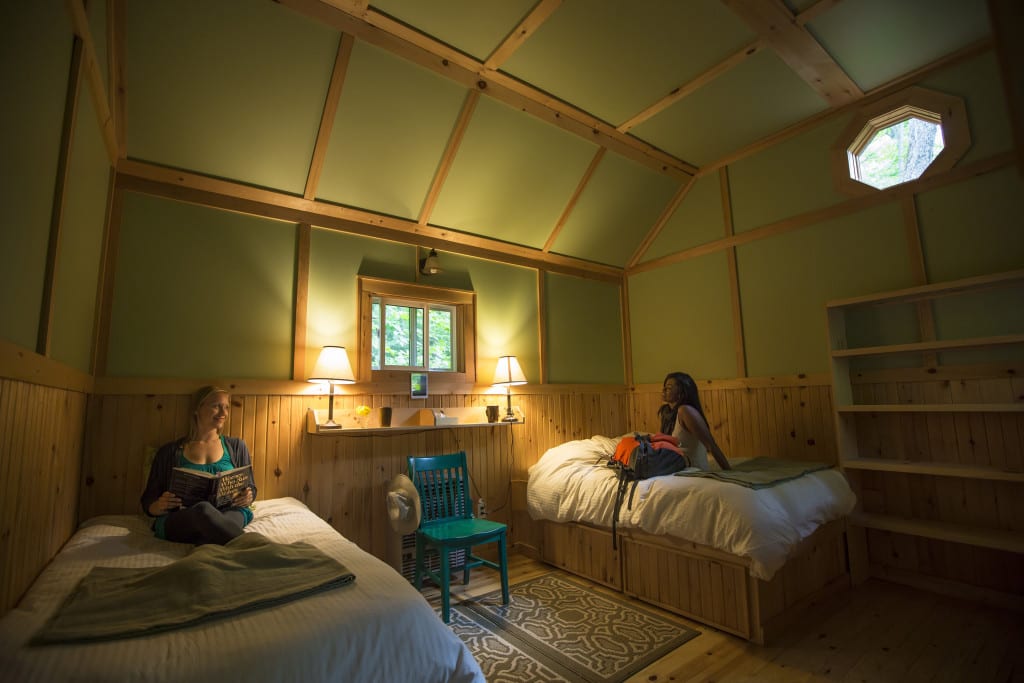 two girls in studio cabin at northern edge algonquin+women's retreat ideas