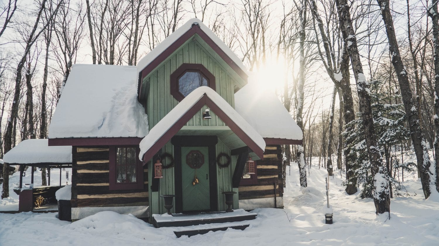 Winter log cabin in Algonquin Park